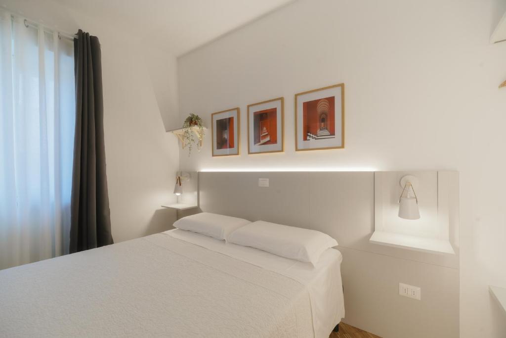 Posteľ alebo postele v izbe v ubytovaní Residence Degli Aranci - Casêta