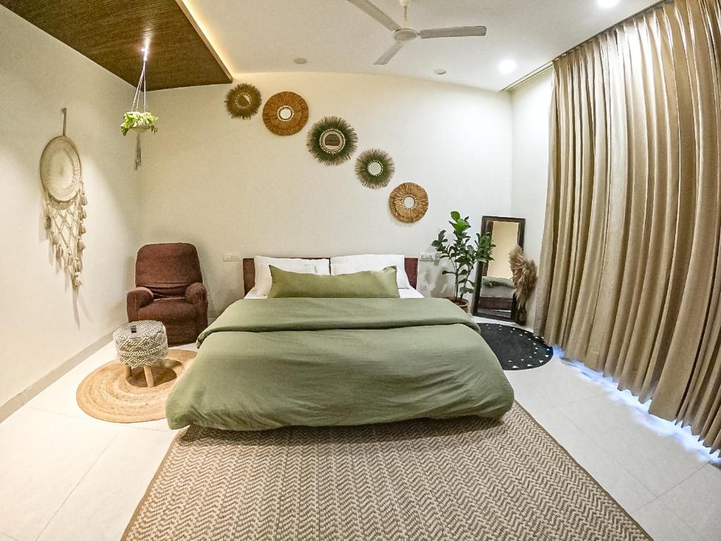 Ένα ή περισσότερα κρεβάτια σε δωμάτιο στο Vamsa Boutique Stay