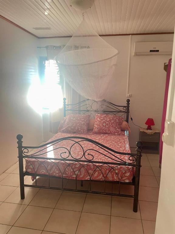 Postel nebo postele na pokoji v ubytování La belle Martinique