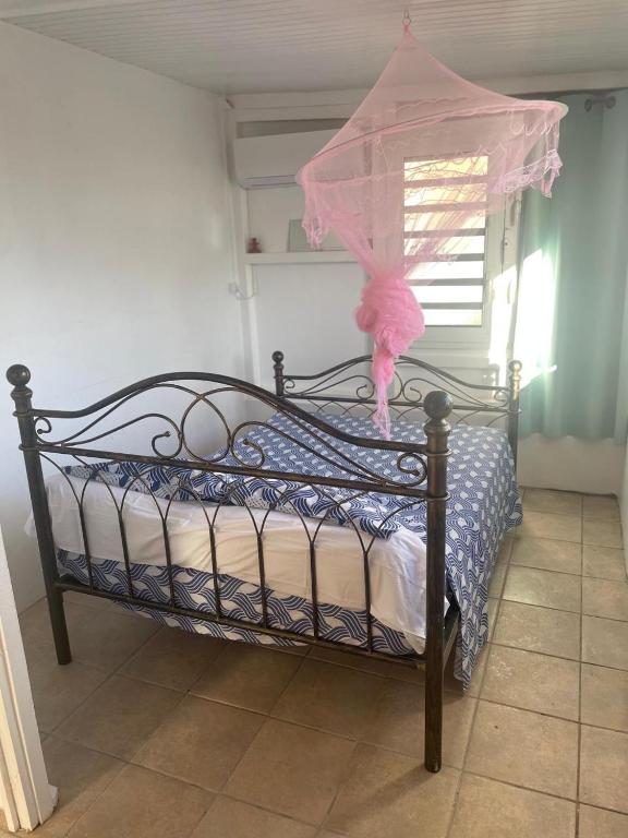 Postel nebo postele na pokoji v ubytování La belle Martinique