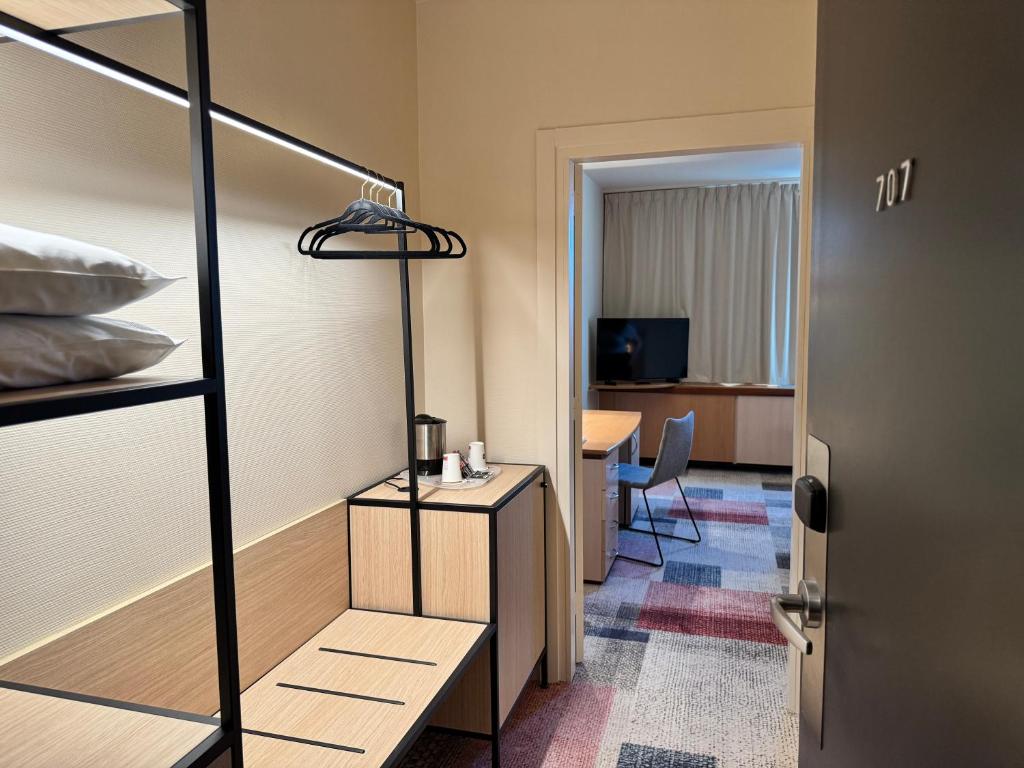 Postel nebo postele na pokoji v ubytování Mercure Besancon Parc Micaud - Hotel & Bar