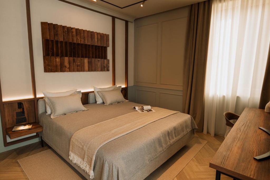 Postel nebo postele na pokoji v ubytování Parc Suites by Hotel Cerbul
