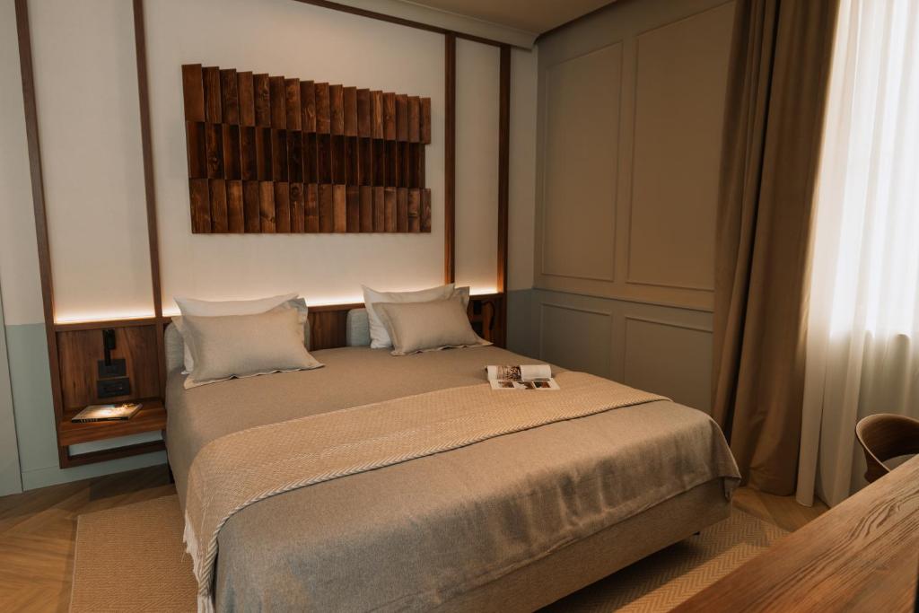Postel nebo postele na pokoji v ubytování Parc Suites by Hotel Cerbul