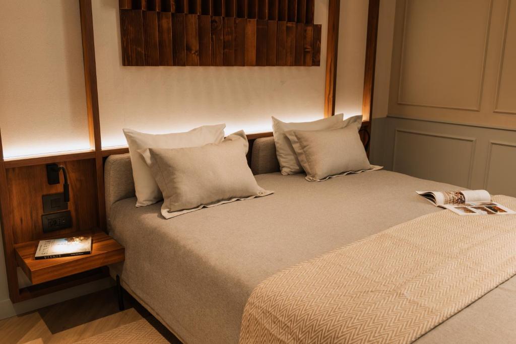 Postel nebo postele na pokoji v ubytování Parc Suites by Hotel Cerbul