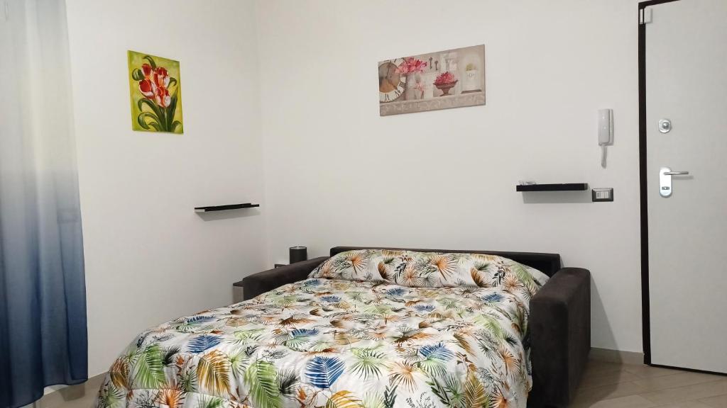 Letto o letti in una camera di Lovely PitStop Fiumicino