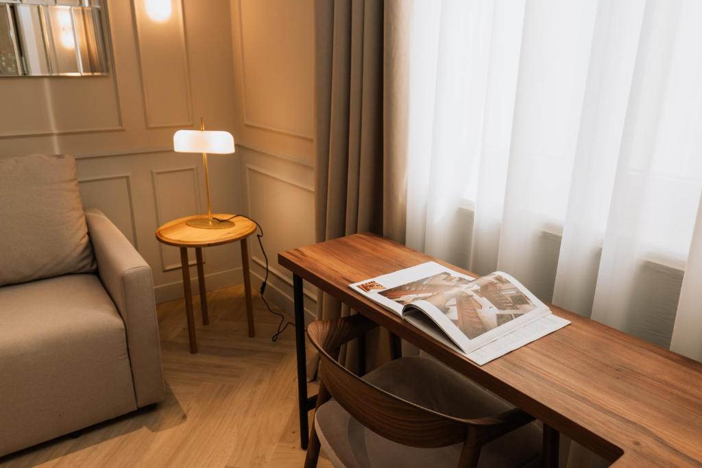 Posezení v ubytování Parc Suites by Hotel Cerbul