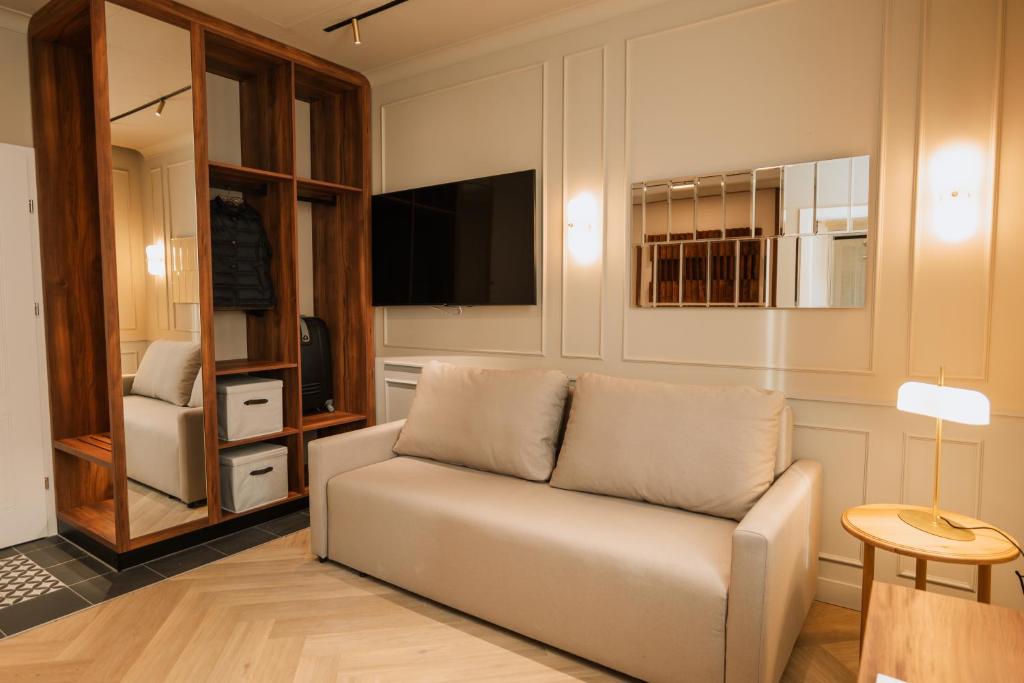 TV a/nebo společenská místnost v ubytování Parc Suites by Hotel Cerbul