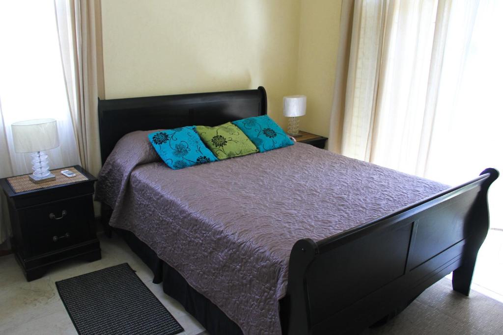 Postel nebo postele na pokoji v ubytování Eclipse Suite Guest Apartment