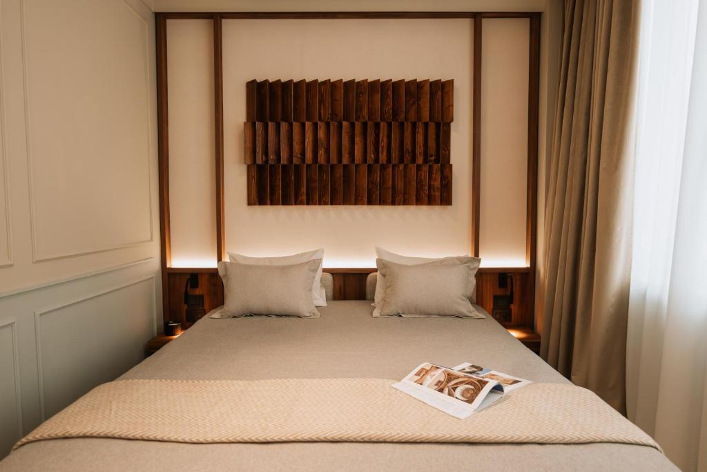 Postel nebo postele na pokoji v ubytování Parc Suites by Hotel Cerbul