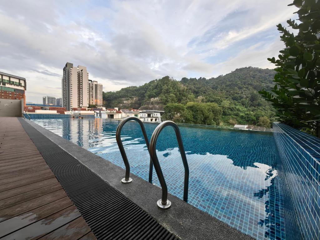 a swimming pool with a view of a city at UCSI Residence 2 By UCSI Hotels in Kuala Lumpur