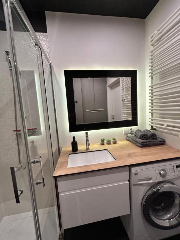 Kúpeľňa v ubytovaní Apartament City Centre 108