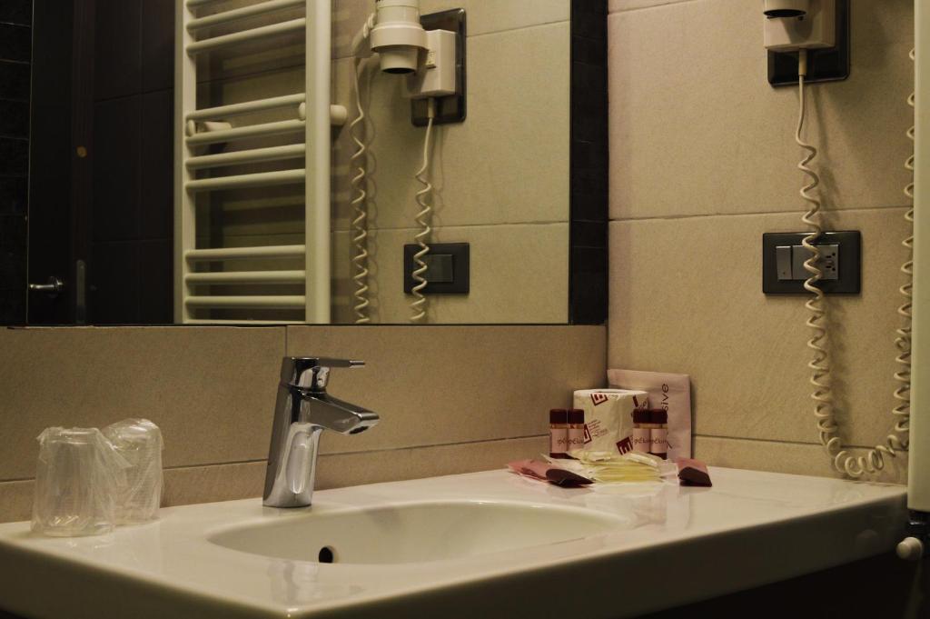 Koupelna v ubytování Hotel Artis