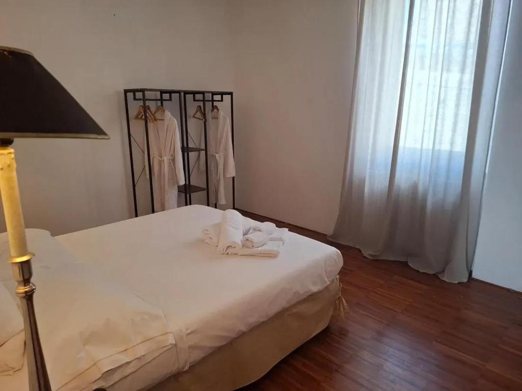 Postel nebo postele na pokoji v ubytování Spacious apartment in Manciano with view