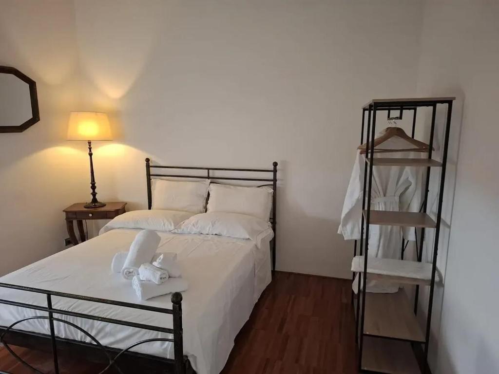 Postel nebo postele na pokoji v ubytování Spacious apartment in Manciano with view