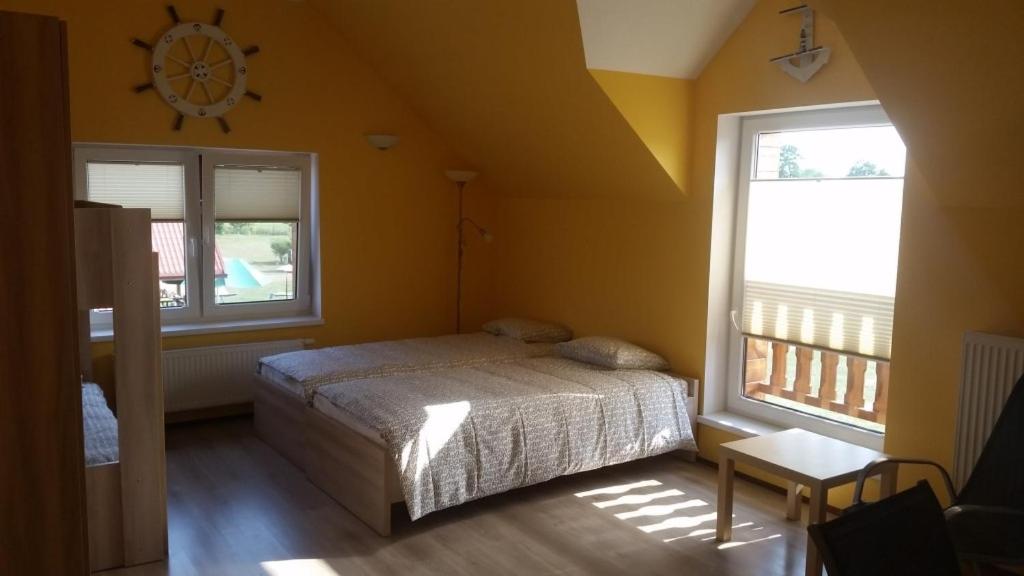 Dom nad Krzywym - prywatna plaża, 2 boiska, sauna, plac zabaw - Sala Familiar Con Baño Privado