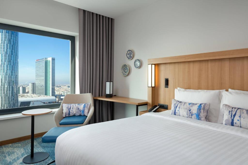Postel nebo postele na pokoji v ubytování Courtyard by Marriott Bucharest Floreasca