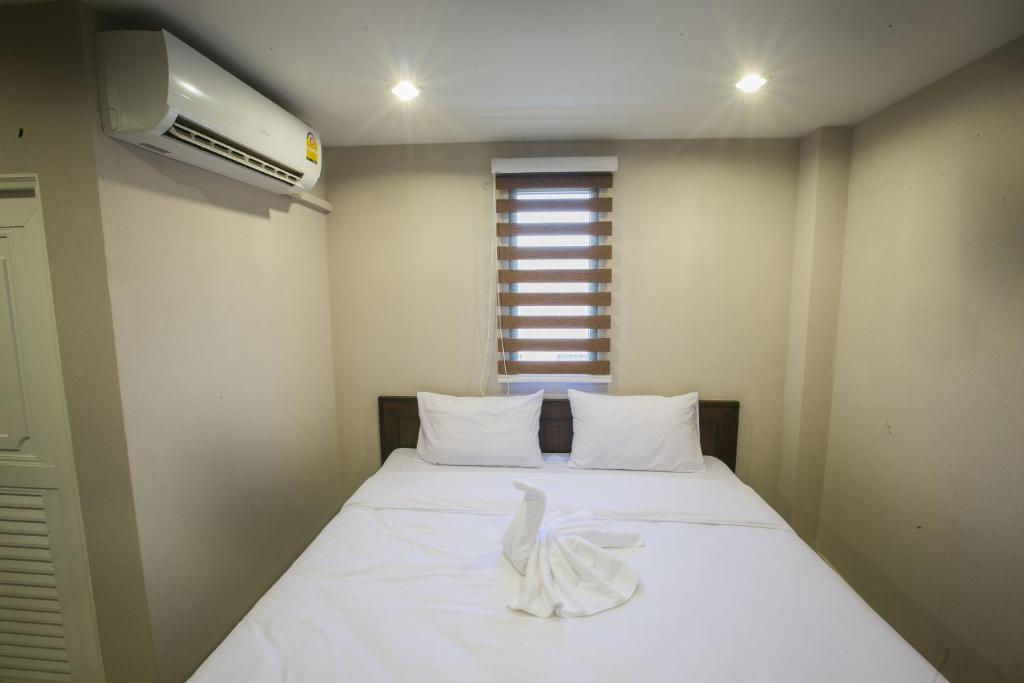 Postel nebo postele na pokoji v ubytování The Sleep Phang-nga