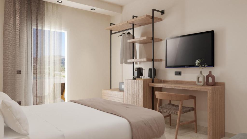 Кровать или кровати в номере Dolphin Bay Seaside Resort & Suites