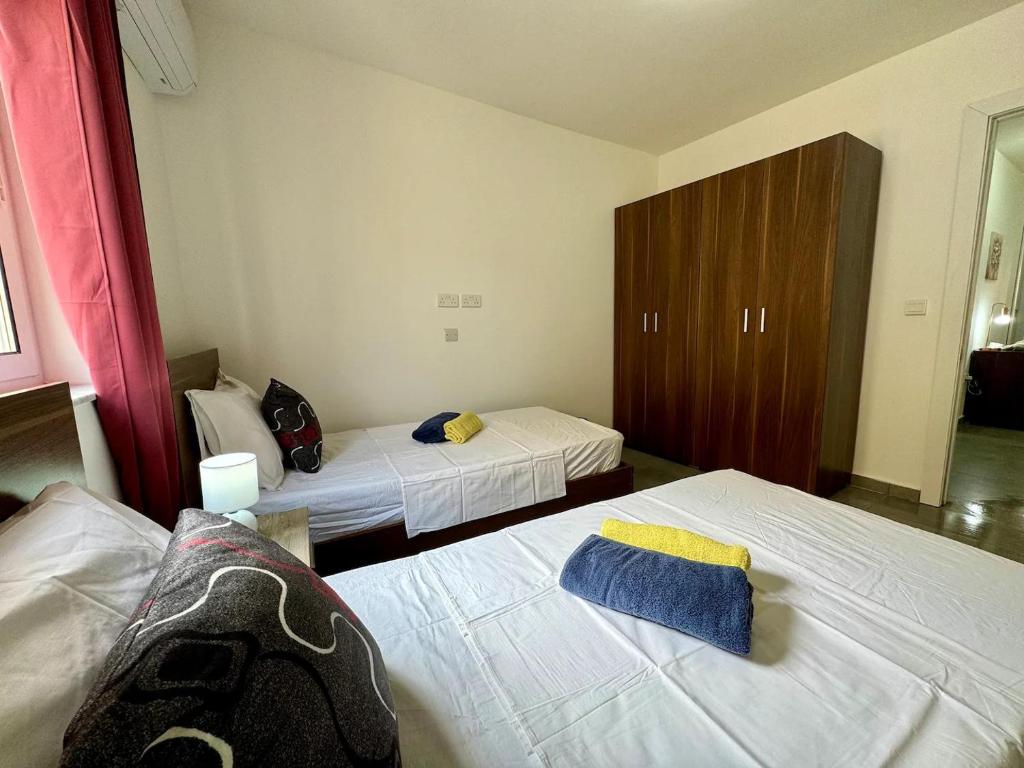 Postel nebo postele na pokoji v ubytování MIVE-Delux Three Bedroom Apartment in Marsaskala