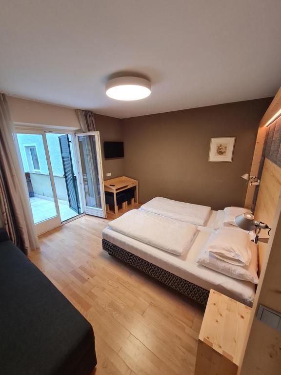 Postel nebo postele na pokoji v ubytování Gasthof Traube