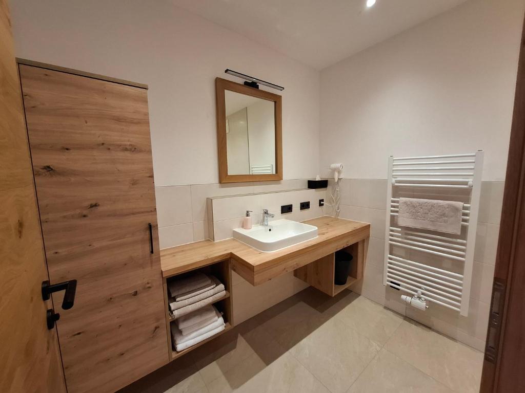 Kúpeľňa v ubytovaní Sonnenappartements Madlstatthof