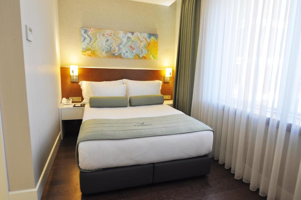 Postel nebo postele na pokoji v ubytování Veyron Hotels & SPA