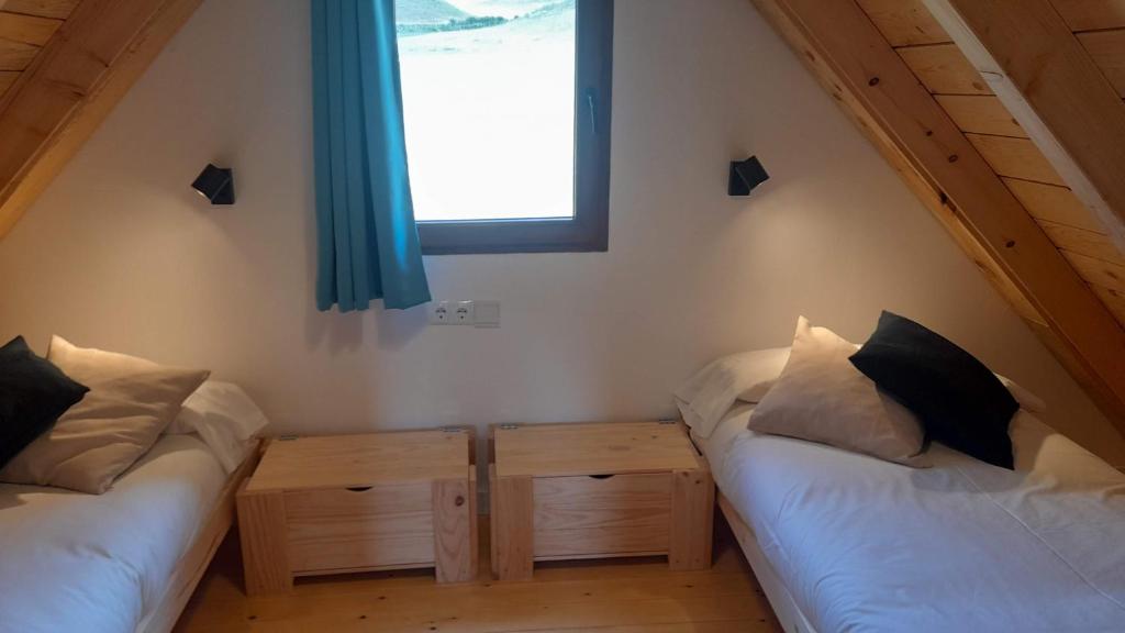 Postel nebo postele na pokoji v ubytování Camping IZARPE