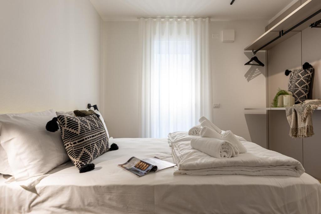 Postel nebo postele na pokoji v ubytování Residence Canova