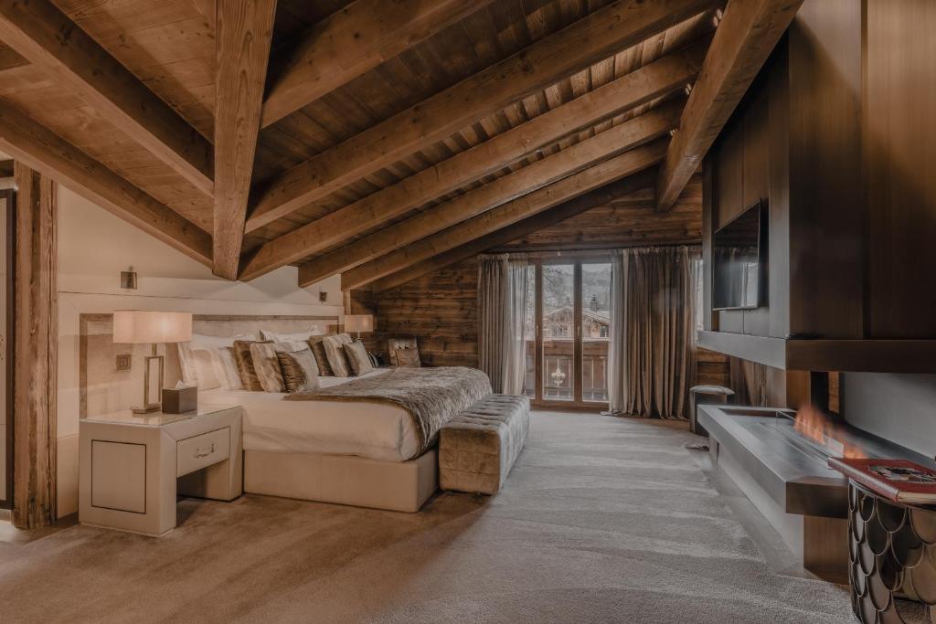 TV a/nebo společenská místnost v ubytování Ultima Hotel Gstaad