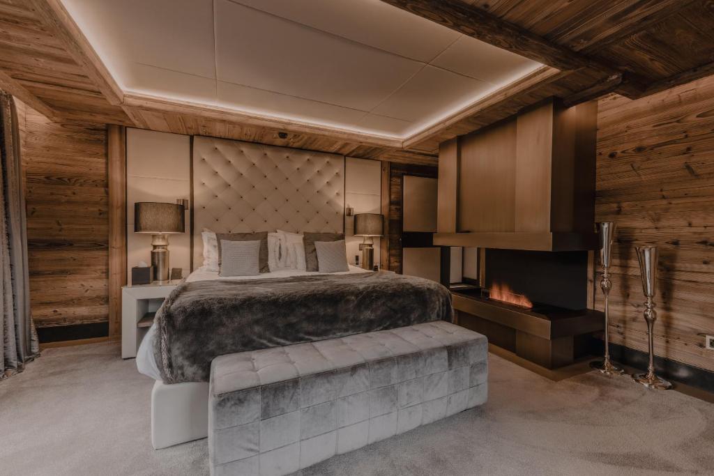Postel nebo postele na pokoji v ubytování Ultima Hotel Gstaad
