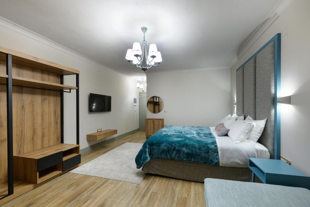 Postel nebo postele na pokoji v ubytování Álbero Hotel