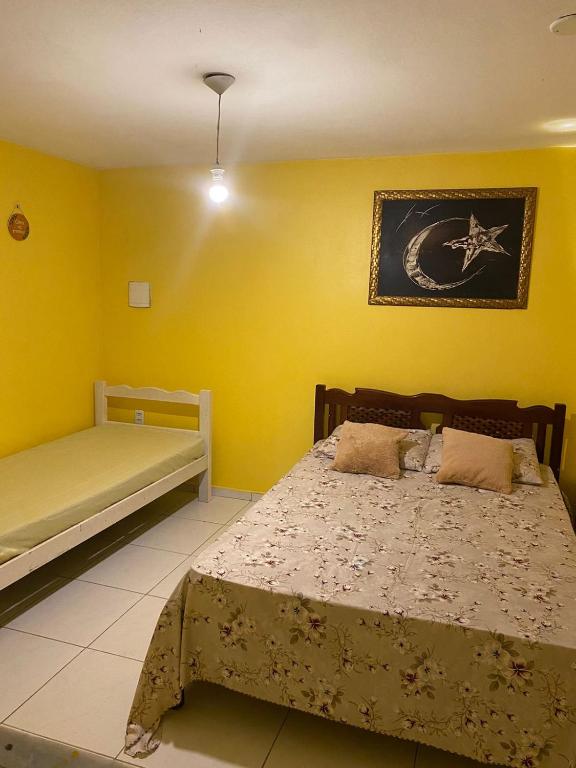 Letto o letti in una camera di Portal do Sol