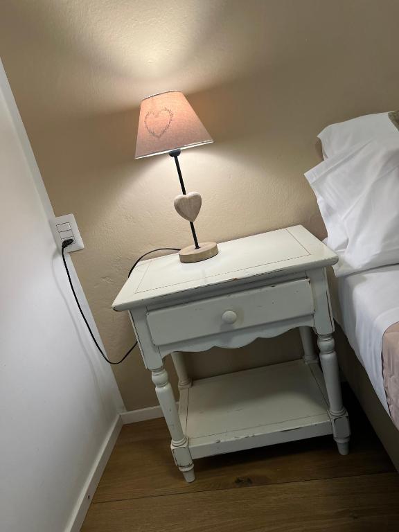 Postel nebo postele na pokoji v ubytování Hotel RivaMia