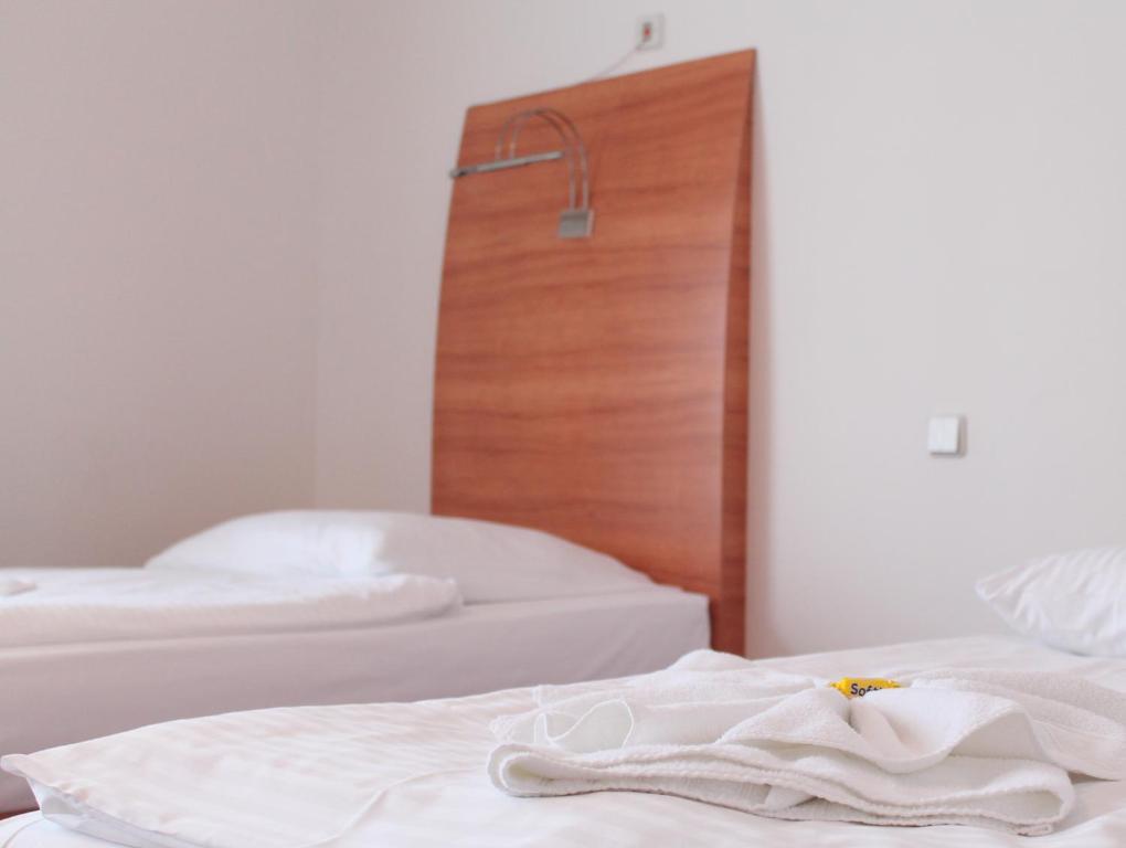 Postel nebo postele na pokoji v ubytování Hotel Kaiser