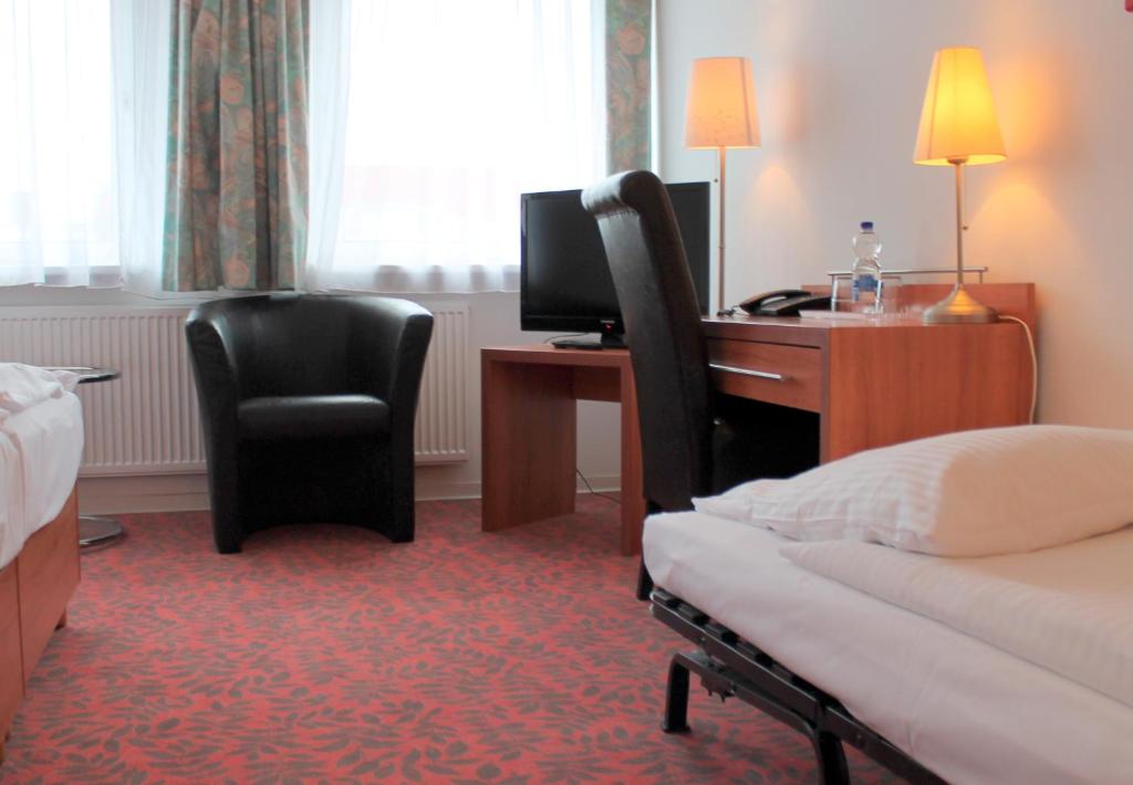 TV a/nebo společenská místnost v ubytování Hotel Kaiser