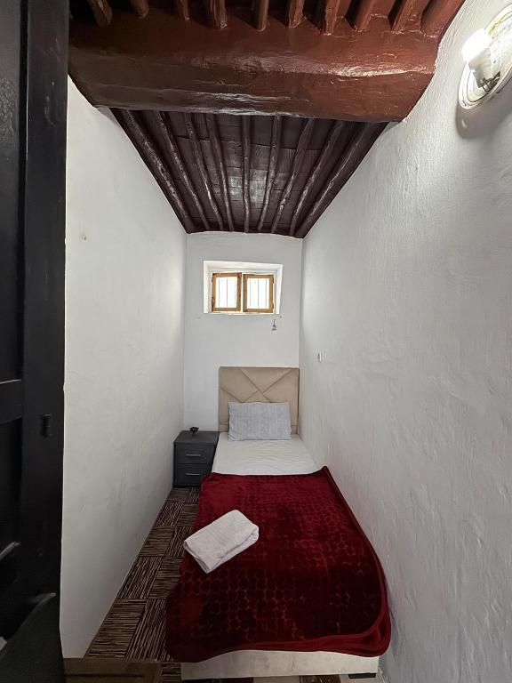 Postel nebo postele na pokoji v ubytování Dar Yamna