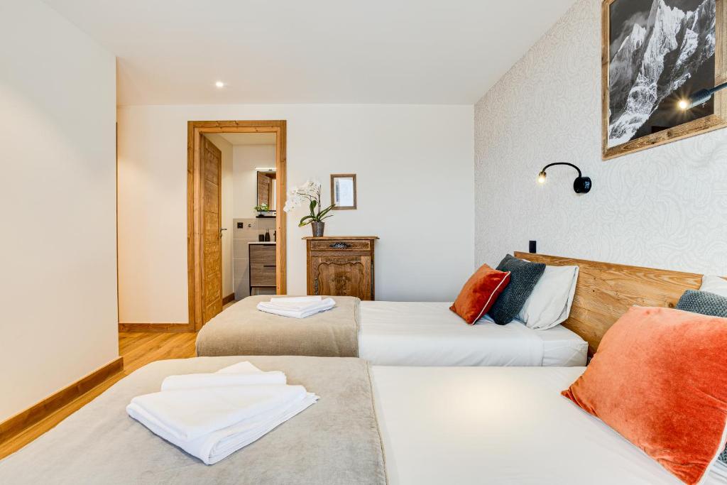 Postel nebo postele na pokoji v ubytování Chalet Ciscana Chamonix MontBlanc