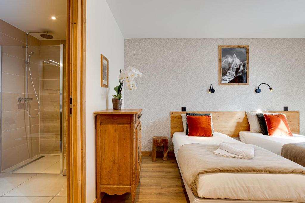 Postel nebo postele na pokoji v ubytování Chalet Ciscana Chamonix MontBlanc