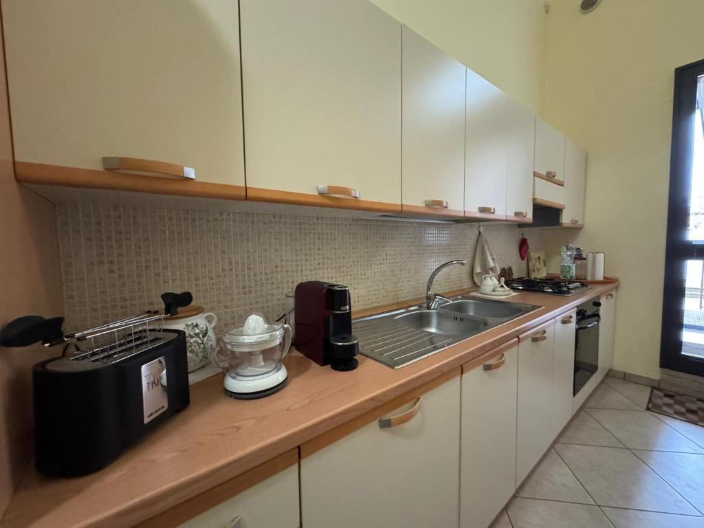 Kuchyň nebo kuchyňský kout v ubytování B&B La Corte