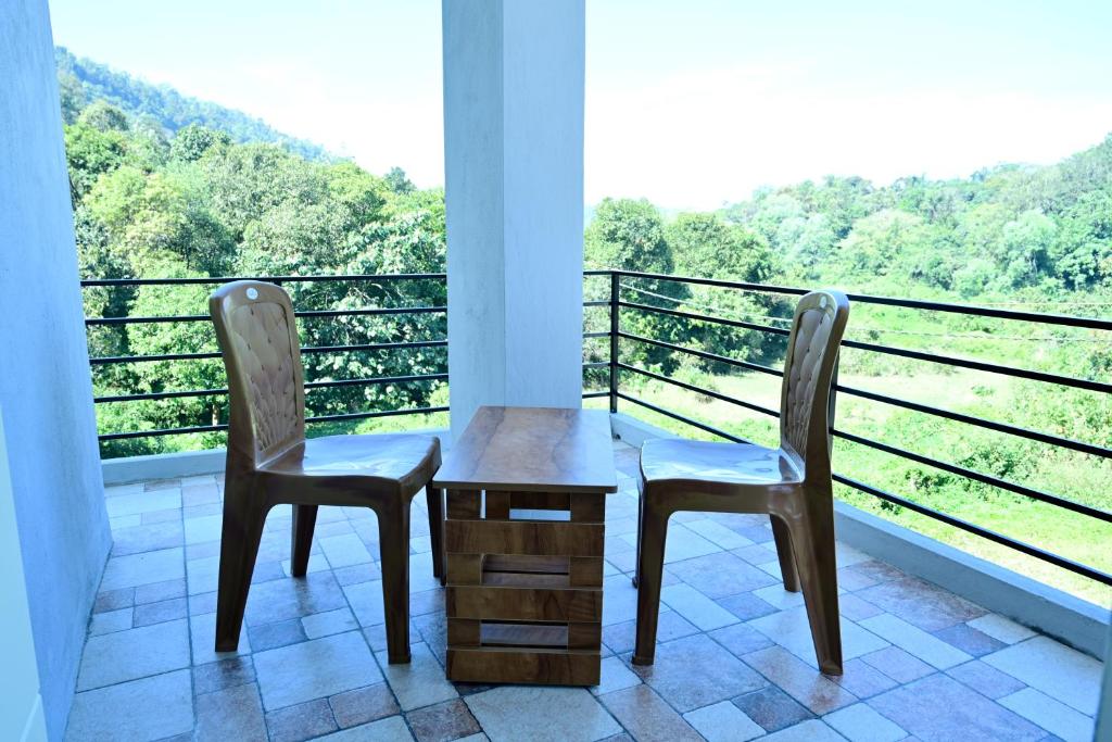 Balkón nebo terasa v ubytování coorg misty mountains guest house
