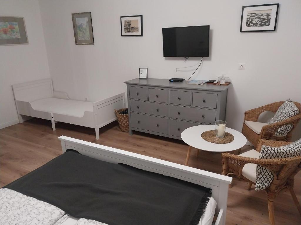 Telewizja i/lub zestaw kina domowego w obiekcie Premium Vendégház