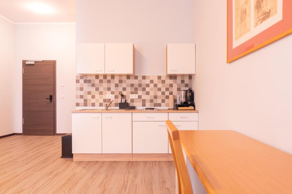 Aparthotel in Leipzig - Vollausgestattete Apartments - Resim 24