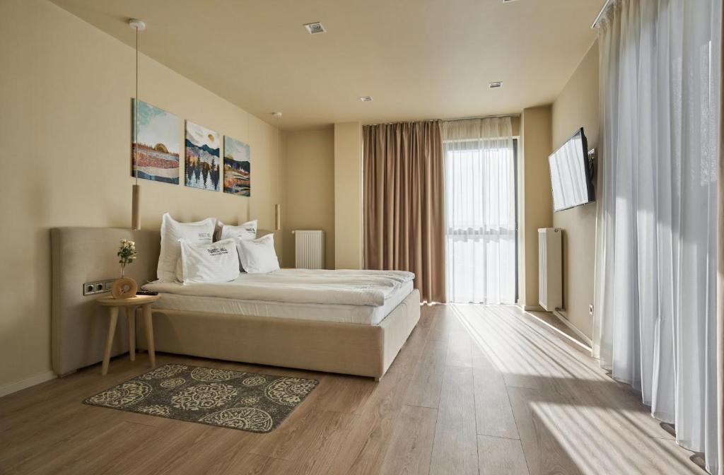 Postel nebo postele na pokoji v ubytování Forest Hill Hotel & SPA