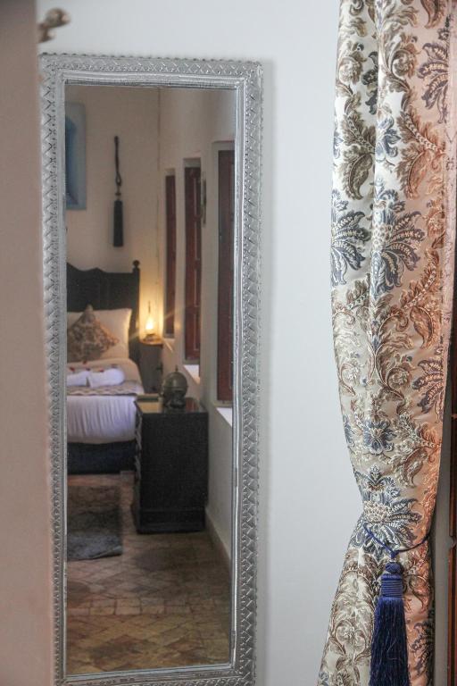 Postel nebo postele na pokoji v ubytování Riad Tizgui
