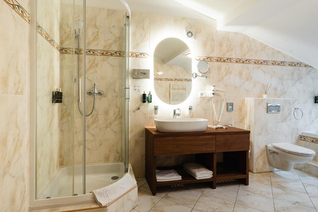 Koupelna v ubytování Hotel Horal