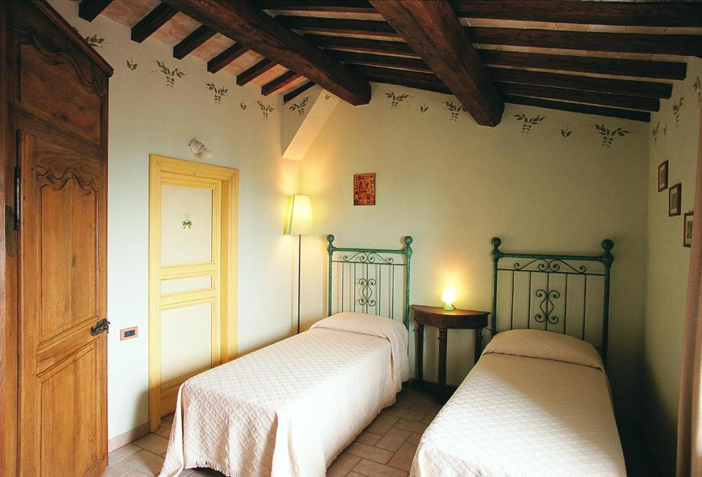Posteľ alebo postele v izbe v ubytovaní Agriturismo Casale nel Parco dei Monti Sibillini