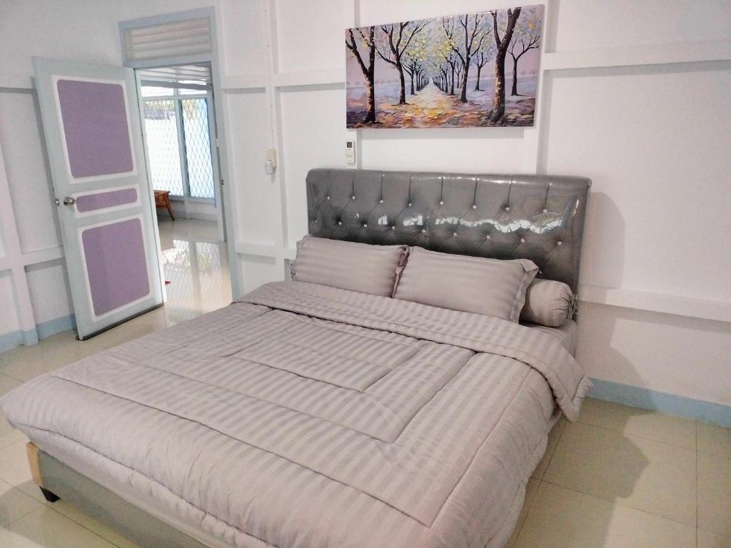 Postel nebo postele na pokoji v ubytování TM guest house 2