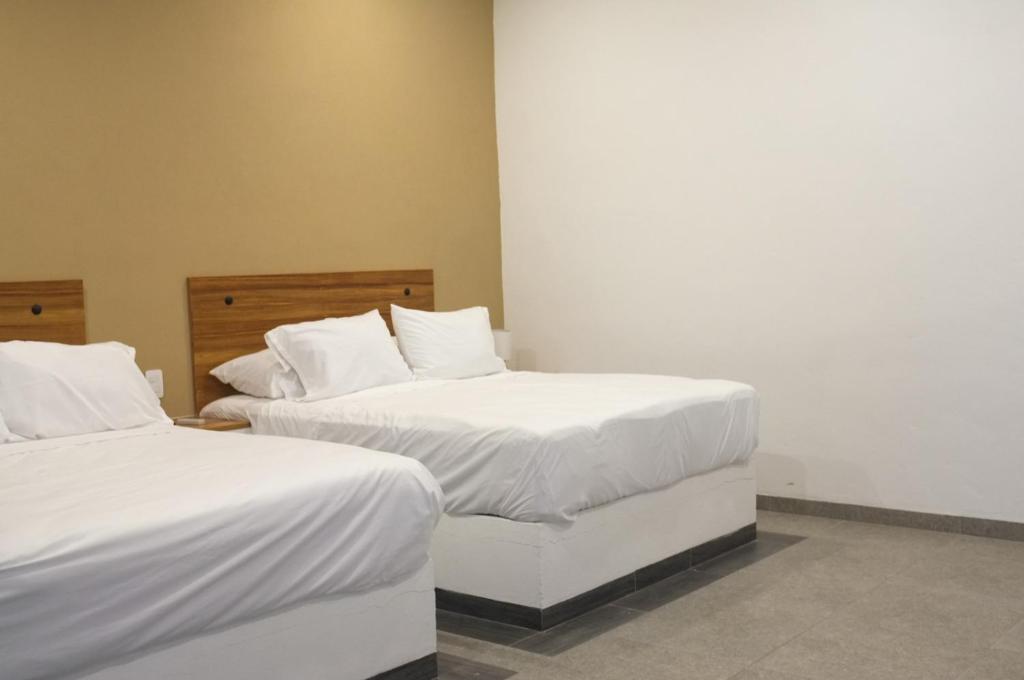 Postel nebo postele na pokoji v ubytování Rancho MM