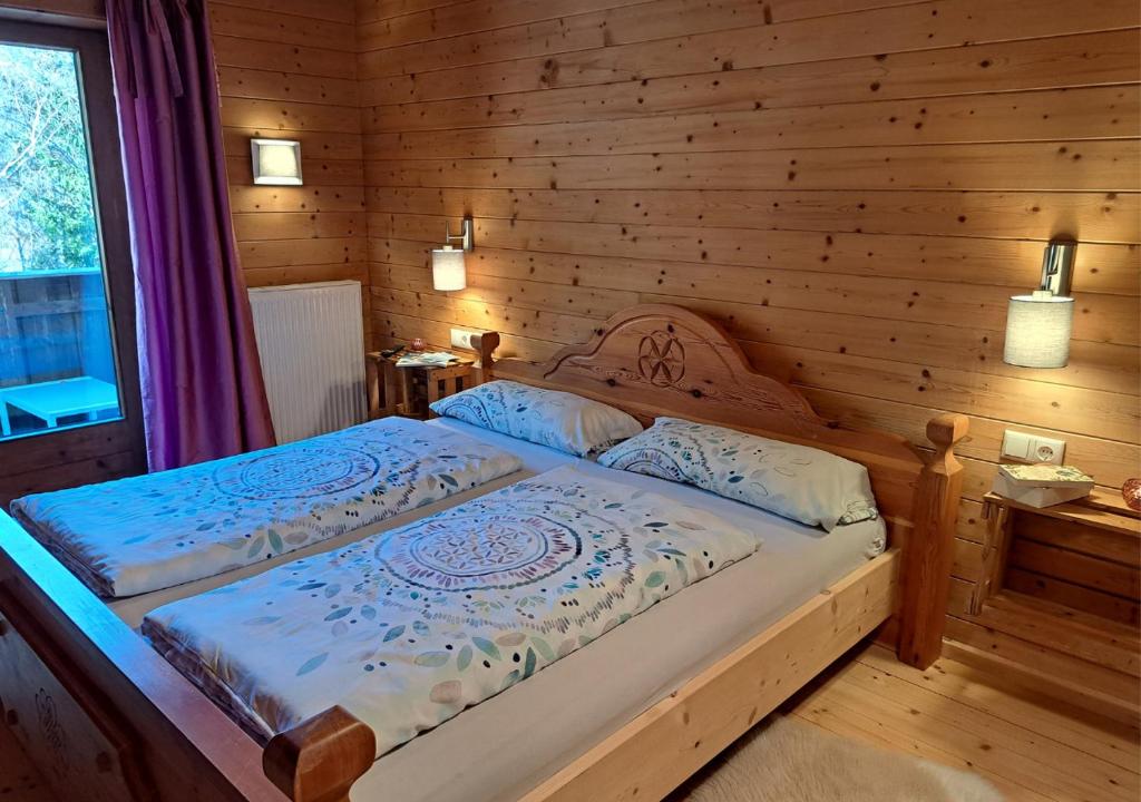 Postel nebo postele na pokoji v ubytování Naturetouch