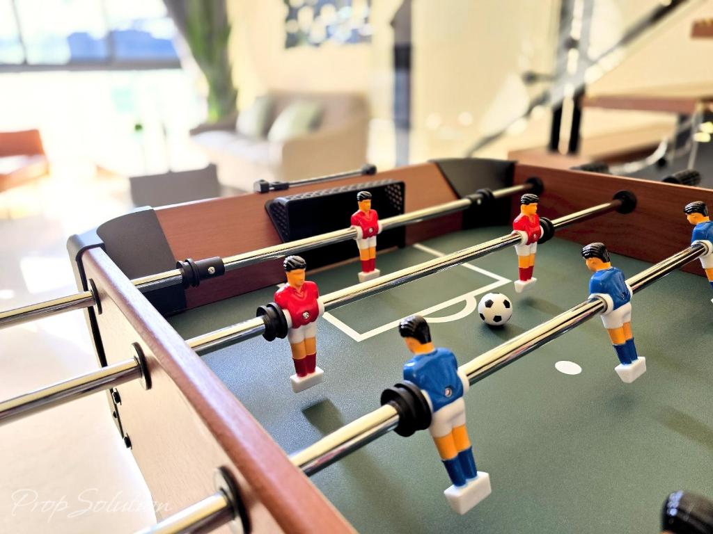 a group of lego men playing a game of soccer at Loft Suite Central City 2BR JB CIQ 7Pax in Johor Bahru